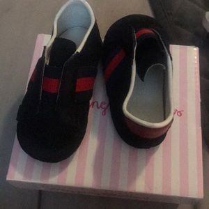 Baby Gucci shoes.
